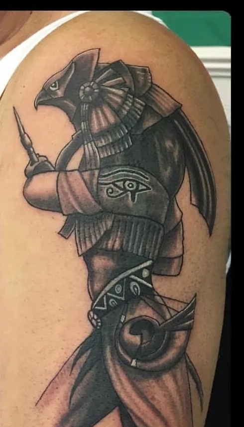 Black and grey Egyptian Horus warrior tattoo with fine shading, N9 Tattoo, Enfield